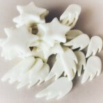 Andenken Stern und Engelsflügel aus Leucht-Fimo