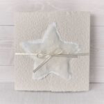 Weihnachtskarte Perlenstern beige